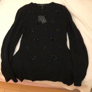 BCBG Embellished Peplum Sweater. Scoop neck